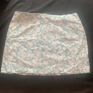 Light blue skirt with daisies